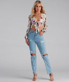With fun and flirty details, Tie The Knot Floral Crop Top shows off your unique style for a trendy outfit for the summer season!