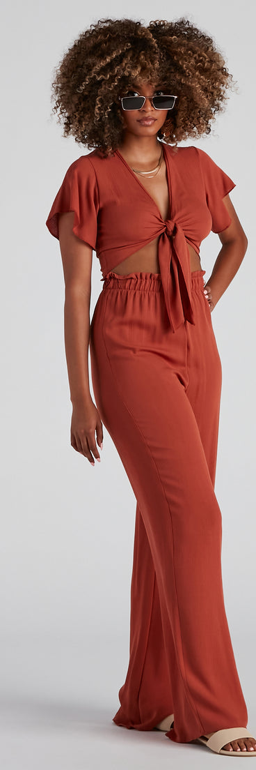 With fun and flirty details, Weekend Mood Tie-Front Top shows off your unique style for a trendy outfit for the summer season!