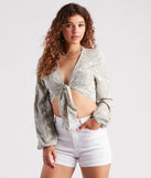 With fun and flirty details, Breezy Beach Babe Tie-Front Top shows off your unique style for a trendy outfit for the summer season!