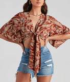 With fun and flirty details, Palisades Paisley Tie-Front Top shows off your unique style for a trendy outfit for the summer season!
