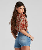 With fun and flirty details, Palisades Paisley Tie-Front Top shows off your unique style for a trendy outfit for the summer season!