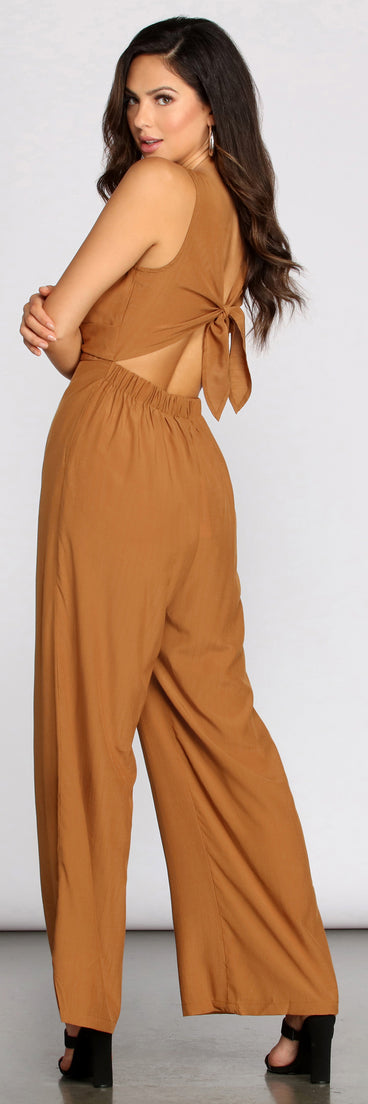 Twist Front Tie Back Jumpsuit provides a stylish start to creating your best summer outfits of the season with on-trend details for 2023!