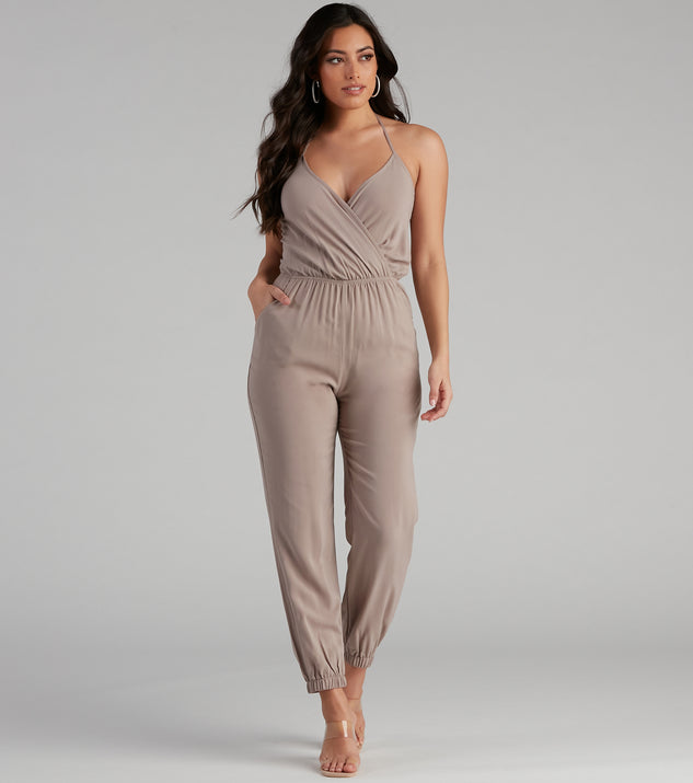 Plunging Into Basics Surplice Jumpsuit provides a stylish start to creating your best summer outfits of the season with on-trend details for 2023!