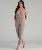 Plunging Into Basics Surplice Jumpsuit provides a stylish start to creating your best summer outfits of the season with on-trend details for 2023!