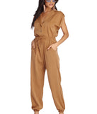 Utility Linen Jumpsuit will help you dress the part in stylish holiday party attire, an outfit for a New Year’s Eve party, & dressy or cocktail attire for any event.
