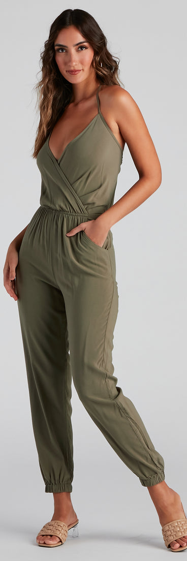 Plunging Into Basics Surplice Jumpsuit provides a stylish start to creating your best summer outfits of the season with on-trend details for 2023!