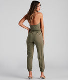 Plunging Into Basics Surplice Jumpsuit provides a stylish start to creating your best summer outfits of the season with on-trend details for 2023!