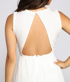 Flirty Ruffles Open Back Romper provides a stylish start to creating your best summer outfits of the season with on-trend details for 2023!