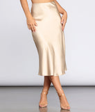 Minimalist Satin Midi Skirt provides a stylish start to creating your best summer outfits of the season with on-trend details for 2023!