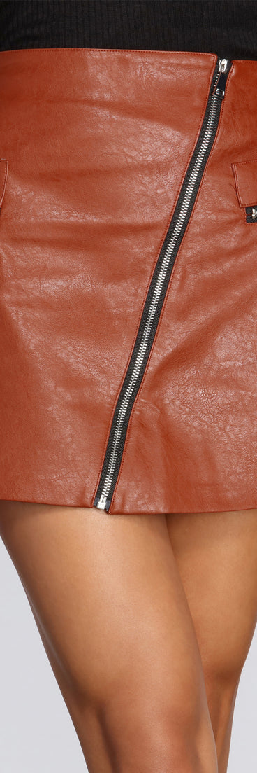 Zip It Up Faux Leather Mini Skirt provides a stylish start to creating your best summer outfits of the season with on-trend details for 2023!