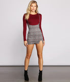 Sassy Plaid Suspender Mini Skirt provides a stylish start to creating your best summer outfits of the season with on-trend details for 2023!