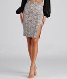 Chic And Sassy Snake Print Midi Skirt elevates your outfits for holiday events, Christmas attire, formal events, or holiday party dresses to look picture-perfect at any event this season!