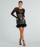 The mini skirt length on the So Fabulous Feather-Trim Faux Leather Mini Skirt adds a sultry detail to your going-out outfits or everyday looks.