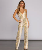 Snake Whisperer Jumpsuit will help you dress the part in stylish holiday party attire, an outfit for a New Year’s Eve party, & dressy or cocktail attire for any event.