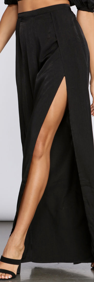 You’ll look stunning in the Flirty Front Slit Wide Leg Pants when paired with its matching separate to create a glam clothing set perfect for parties, date nights, concert outfits, back-to-school attire, or for any summer event!