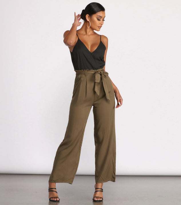 Two Tone Sleeveless V-Neck Paperbag Jumpsuit will help you dress the part in stylish holiday party attire, an outfit for a New Year’s Eve party, & dressy or cocktail attire for any event.