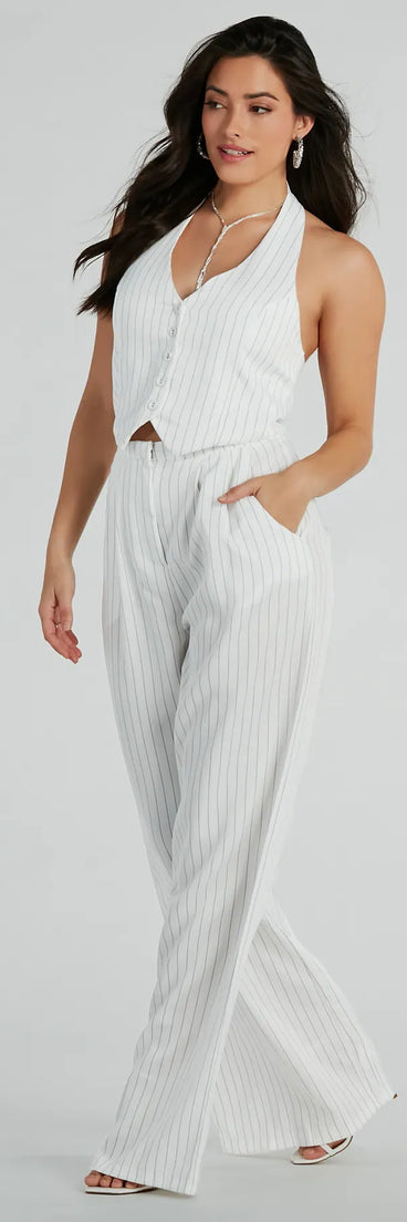 The Getaway Vibes Wide-Leg Pinstripe Woven Jumpsuit is an elevated one-piece that blends sleek sophistication with playful charm, perfect for nailing casual or formal outfits.