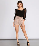 Poised Paperbag High Waist Taupe Woven Shorts Outfit styled with Black Statement Sleeve Blouse and Black Block Heels