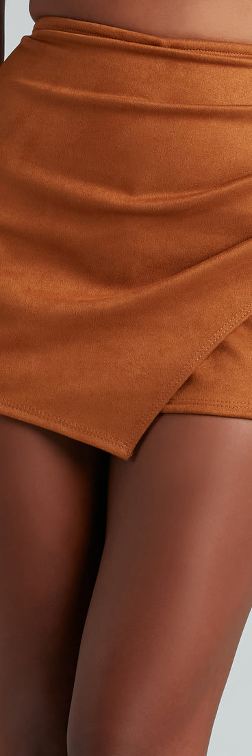 The Stylish Perfection Faux Wrap Skort offers a discreetly comfy fit with shorts under a stylish skirt overlay featuring the latest accents and details.