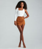 The Stylish Perfection Faux Wrap Skort offers a discreetly comfy fit with shorts under a stylish skirt overlay featuring the latest accents and details.