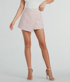 The mini skirt length on the Preppy Beauty Tweed Faux Pearl Button Plaid Skort adds a sultry detail to your going-out outfits or everyday looks.