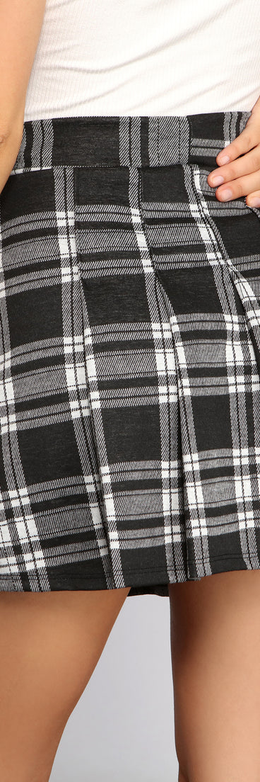 Plaid And Pleated Mini Skirt provides a stylish start to creating your best summer outfits of the season with on-trend details for 2023!