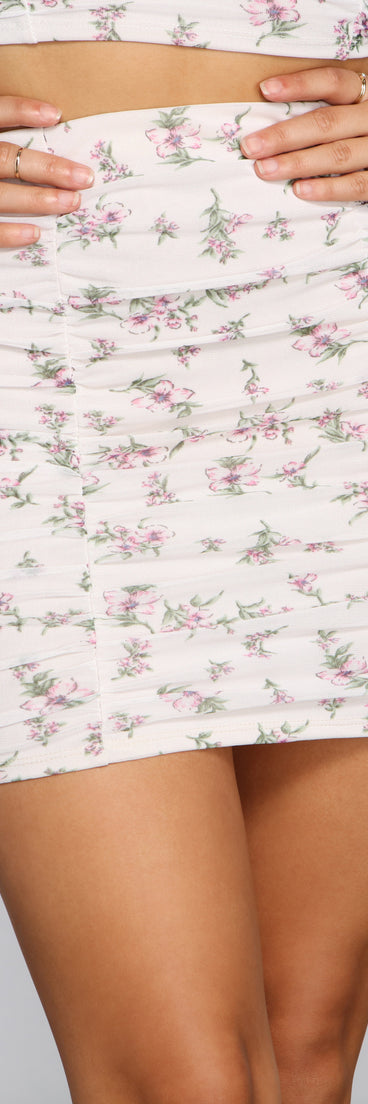 Charming Beauty Ditsy Floral Mini Skirt provides a stylish start to creating your best summer outfits of the season with on-trend details for 2023!