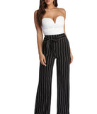 Poised In Pinstripe Pants