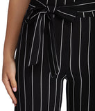 Poised In Pinstripe Pants
