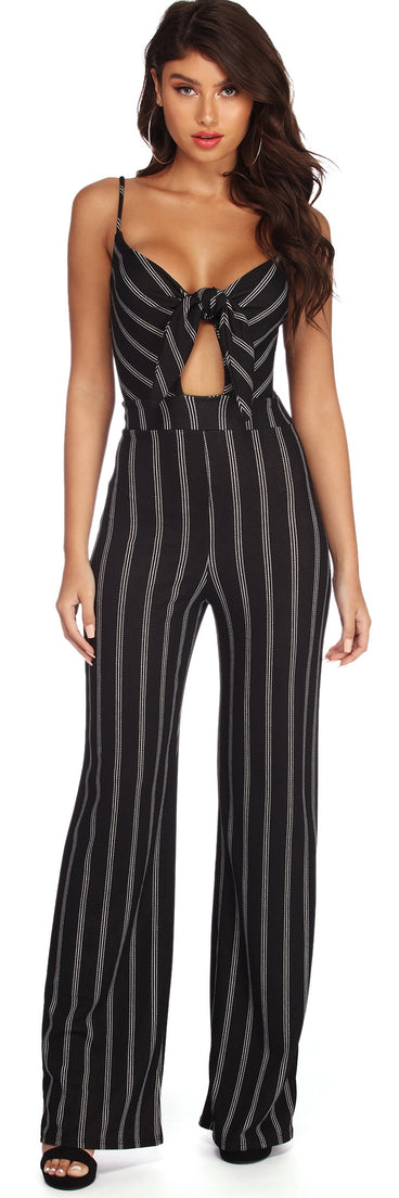 Stand Out Striped Tie Front Jumpsuit will help you dress the part in stylish holiday party attire, an outfit for a New Year’s Eve party, & dressy or cocktail attire for any event.