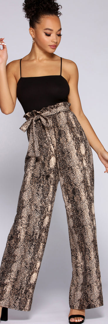 All That Snake Jumpsuit will help you dress the part in stylish holiday party attire, an outfit for a New Year’s Eve party, & dressy or cocktail attire for any event.