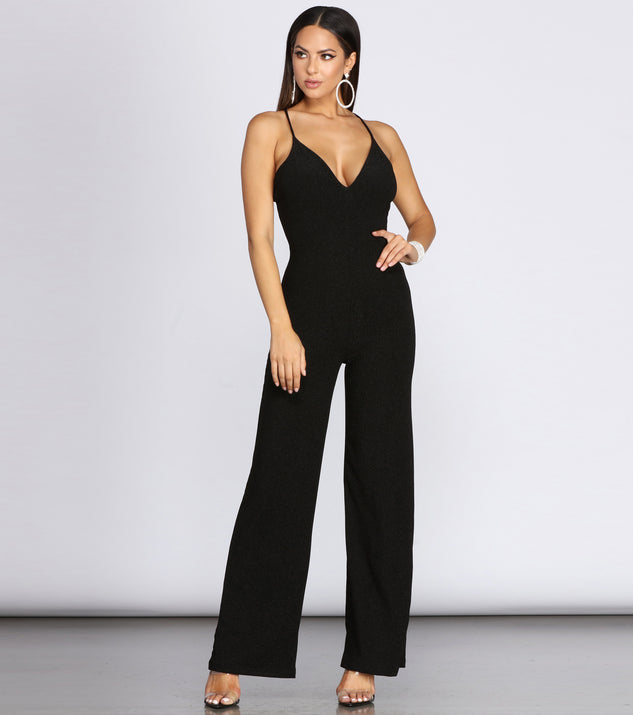 Glowing In The Spotlight Glitter Jumpsuit will help you dress the part in stylish holiday party attire, an outfit for a New Year’s Eve party, & dressy or cocktail attire for any event.