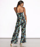 Tropical Floral Sleeveless Wide Leg Jumpsuit provides a stylish start to creating your best summer outfits of the season with on-trend details for 2023!