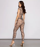 Sleek Snake Print Mesh Catsuit provides a stylish start to creating your best summer outfits of the season with on-trend details for 2023!