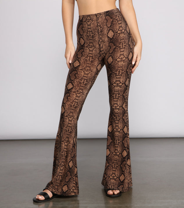 Charming And Chic Snake Print Flared Pants is a trendy pick to create 2023 festival outfits, festival dresses, outfits for concerts or raves, and complete your best party outfits!