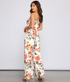 Stunning Beauty Floral Jumpsuit provides a stylish start to creating your best summer outfits of the season with on-trend details for 2023!
