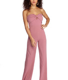 Twist Front Strapless Jumpsuit will help you dress the part in stylish holiday party attire, an outfit for a New Year’s Eve party, & dressy or cocktail attire for any event.