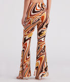 Totally Retro Swirl Print Flare Pants is a fire pick to create 2023 festival outfits, concert dresses, outfits for raves, or to complete your best party outfits or clubwear!