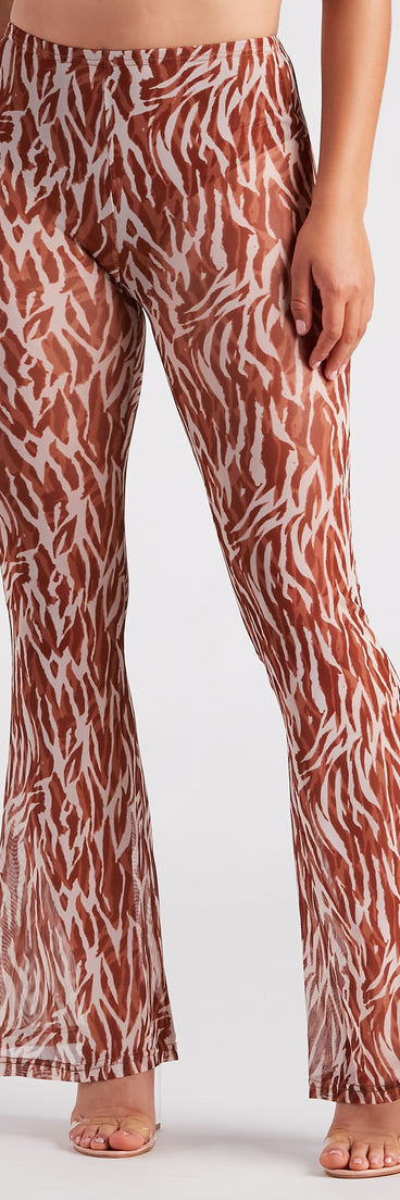 Quick Instinct Zebra Print Mesh Flare Pants is a fire pick to create a concert outfit, 2024 festival looks, outfits for raves, or to complete your best party outfits or clubwear!