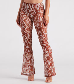 Quick Instinct Zebra Print Mesh Flare Pants is a fire pick to create 2023 festival outfits, concert dresses, outfits for raves, or to complete your best party outfits or clubwear!