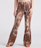 Eye-Catching Allure Printed Flare Pants is a fire pick to create 2023 festival outfits, concert dresses, outfits for raves, or to complete your best party outfits or clubwear!