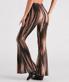 Festival Muse Printed Flare Pants is a fire pick to create a concert outfit, 2024 festival looks, outfits for raves, or to complete your best party outfits or clubwear!