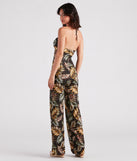 Mojito Please Tropical Halter Jumpsuit provides a stylish start to creating your best summer outfits of the season with on-trend details for 2023!