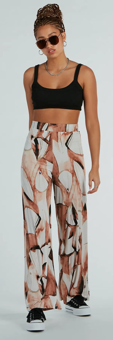 Refresh your fall closet with stylish women's pants like the Like A Work Of Art Abstract Wide Leg Palazzo Pants in a sleek fabric and a pant leg style that makes your look unique.