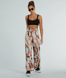 Refresh your fall closet with stylish women's pants like the Like A Work Of Art Abstract Wide Leg Palazzo Pants in a sleek fabric and a pant leg style that makes your look unique.