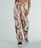 Refresh your fall closet with stylish women's pants like the Like A Work Of Art Abstract Wide Leg Palazzo Pants in a sleek fabric and a pant leg style that makes your look unique.