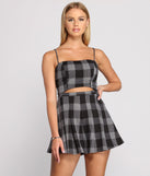 Poised in Plaid Tie Back Romper provides a stylish start to creating your best summer outfits of the season with on-trend details for 2023!
