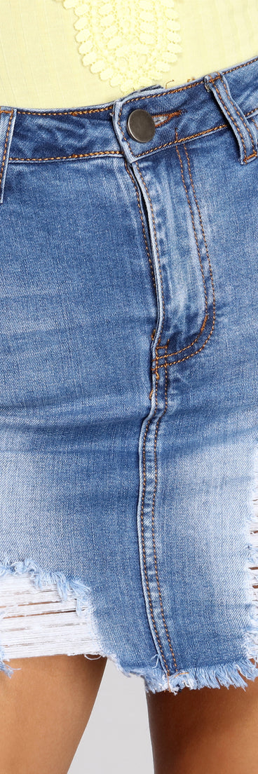With fun and flirty details, Super Distressed Denim Mini Skirt shows off your unique style for a trendy outfit for the summer season!