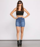 Fab And Frayed Blue Denim Mini Skirt styled with Black Tank Crop Top, Silver Bracelet, Silver Hoop Earrings, Windsor sunglasses and Black Pointed Toe Ankle Boots