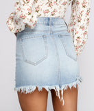 Elise Frayed Denim Mini Skirt provides a stylish start to creating your best summer outfits of the season with on-trend details for 2023!
